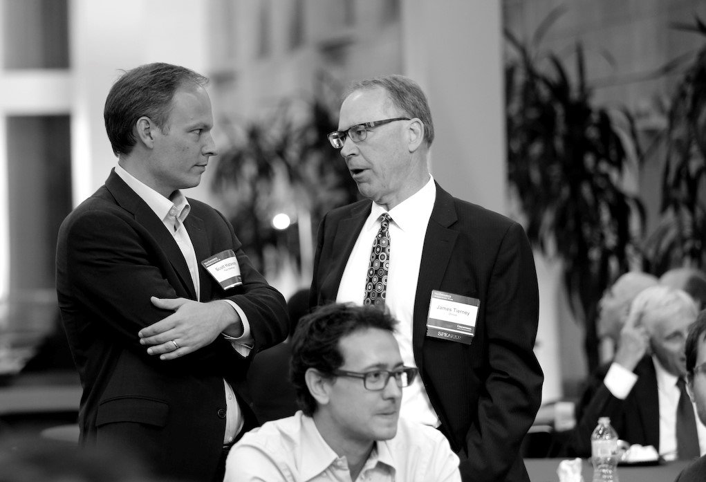 C. Scott Hataway in conversation at a professional event